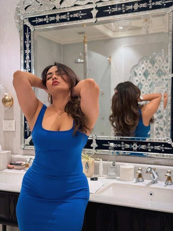 Exotic Asian call girl smiling softly for private hotel room meetings